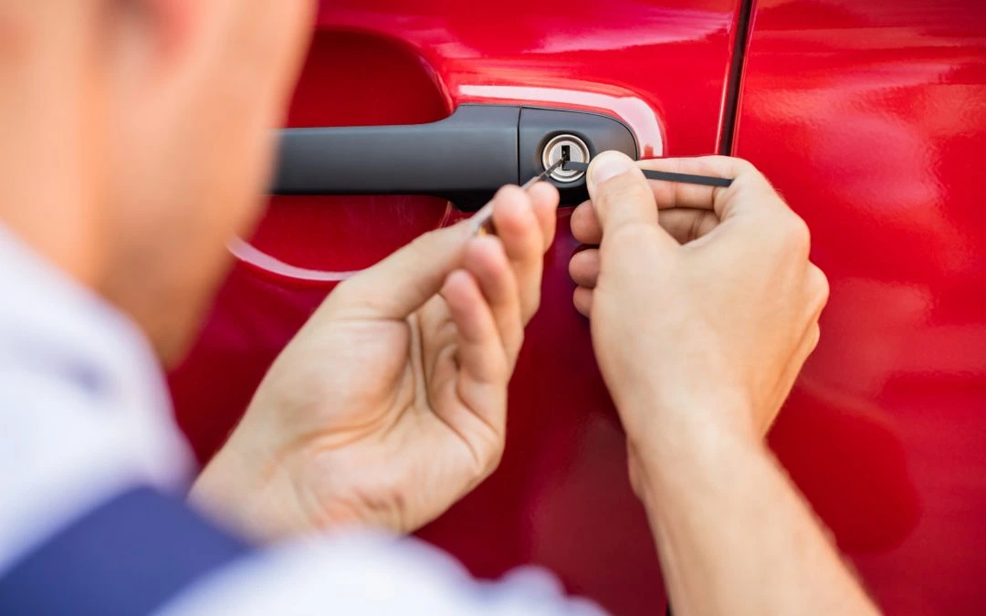 Automotive locksmith repairing a vehicle ignition